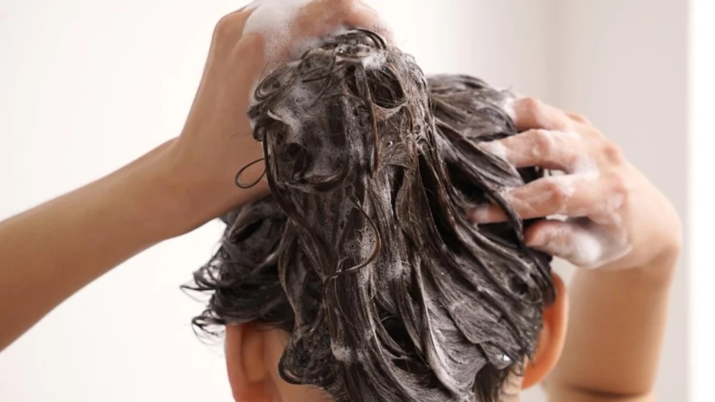 therunwaylooks why my hair is frizzy applying products to wet hair image